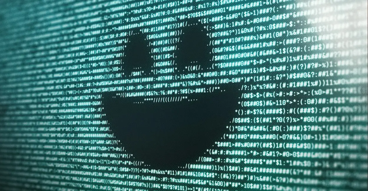 Imagem do episódio Smithereens da série Black Mirror (2011–atualmente), mostrando uma tela com códigos em verde formando um rosto sorridente pixelado — representação visual do impacto das tecnologias e redes sociais no comportamento humano e na vigilância digital.