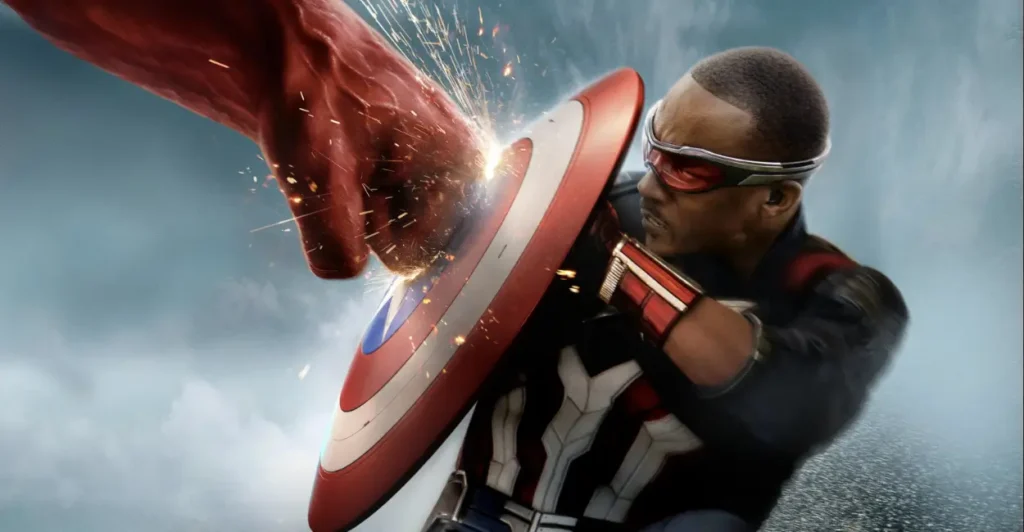 Cena de Capitão América: Admirável Mundo Novo (2025), com Sam Wilson (interpretado por Anthony Mackie) usando o escudo do Capitão América para bloquear um poderoso golpe — simbolizando sua nova era como o herói principal no Universo Cinematográfico da Marvel após os eventos de Falcão e o Soldado Invernal.