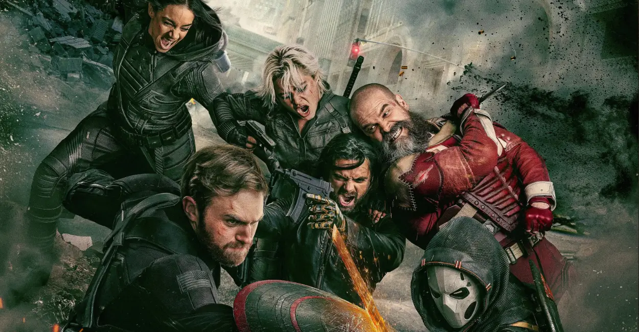 Integrantes dos Thunderbolts em cena de ação intensa com cenário de destruição urbana ao fundo, representando o grupo anti-heróico do Universo Marvel.